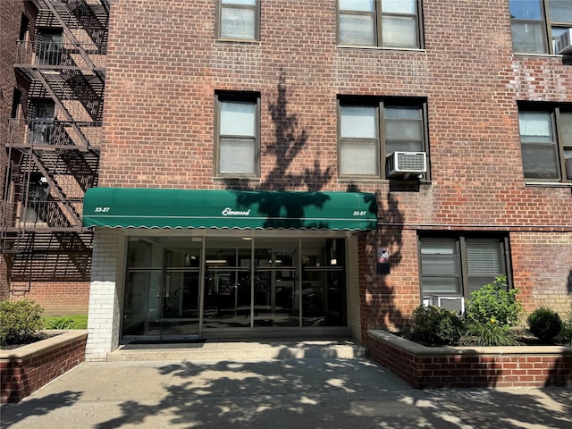 33-27 91st St Unit 5F, Jackson Heights, NY 11372 - view of building exterior with cooling unit