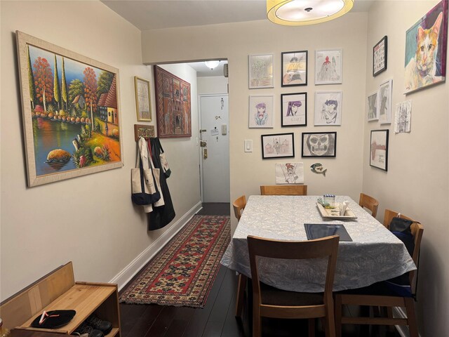 33-27 91st St Unit 5F, Jackson Heights, NY 11372 - dining room with wood finished floors and baseboards