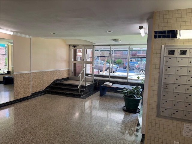 33-27 91st St Unit 5F, Jackson Heights, NY 11372 - lobby featuring wainscoting