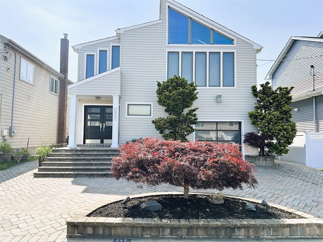 220 Lee Pl, Bellmore, NY 11710 - view of front of property with french doors