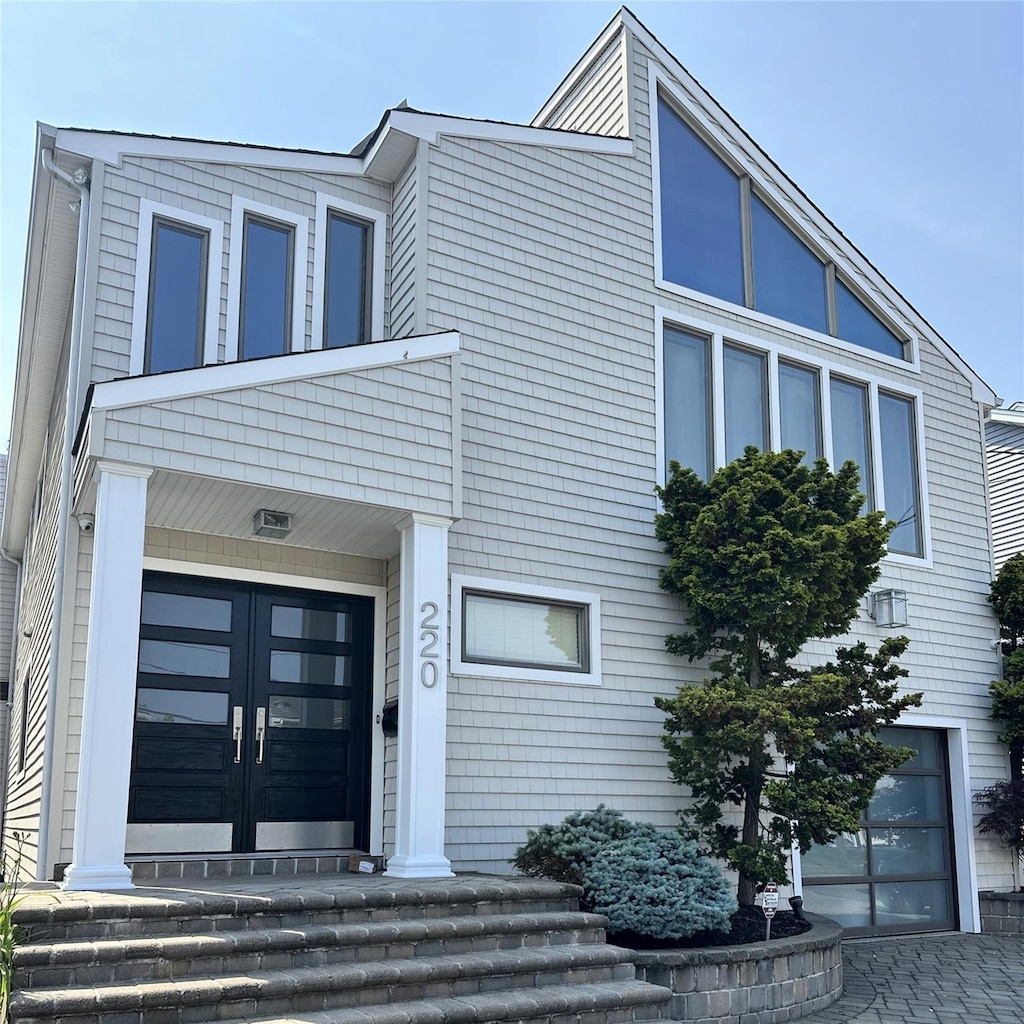 220 Lee Pl, Bellmore, NY 11710 - view of front of property featuring french doors