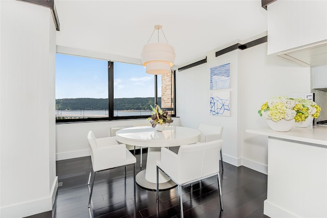 2287 Johnson Ave Unit 17J, Bronx, NY 10463 - dining space featuring dark wood-type flooring and a water view