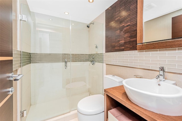 2287 Johnson Ave Unit 17J, Bronx, NY 10463 - full bathroom with tile walls, a shower stall, vanity, recessed lighting, and tasteful backsplash