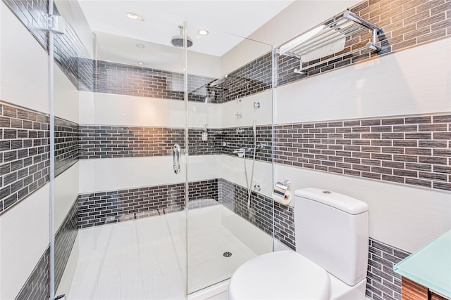 2287 Johnson Ave Unit 17J, Bronx, NY 10463 - bathroom featuring tile walls, a stall shower, and recessed lighting