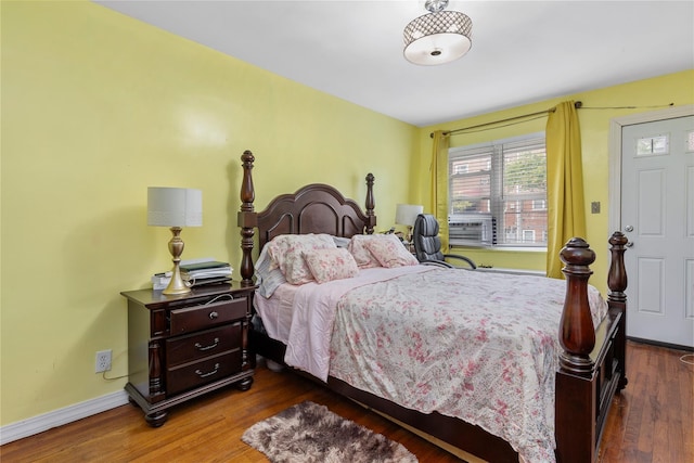 1157 E 102nd St, Brooklyn, NY 11236 - bedroom with dark wood-style floors and baseboards