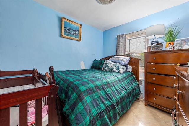 1157 E 102nd St, Brooklyn, NY 11236 - bedroom featuring light tile patterned flooring