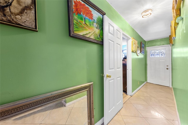 1157 E 102nd St, Brooklyn, NY 11236 - hall featuring light tile patterned flooring and baseboards