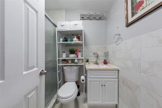 1157 E 102nd St, Brooklyn, NY 11236 - bathroom with vanity, tile walls, and a shower with door