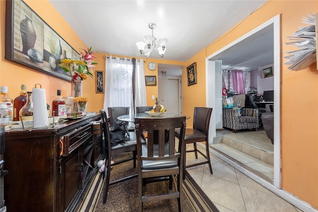 1157 E 102nd St, Brooklyn, NY 11236 - dining space featuring a chandelier and light tile patterned floors