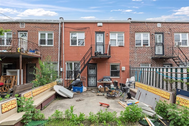 1157 E 102nd St, Brooklyn, NY 11236 - back of house featuring brick siding and cooling unit