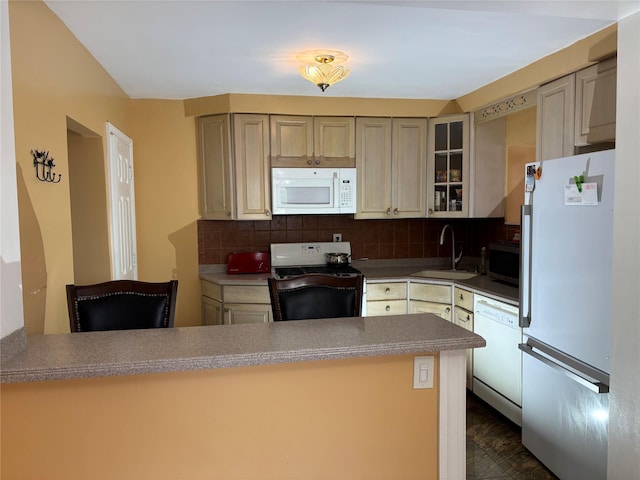 92 Norfeld Blvd, Elmont, NY 11003 - kitchen with white appliances, decorative backsplash, glass insert cabinets, and a peninsula