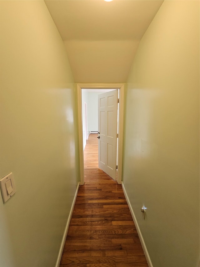 92 Norfeld Blvd, Elmont, NY 11003 - hall featuring lofted ceiling, dark wood-type flooring, and a baseboard radiator
