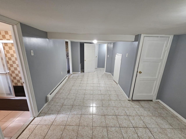 92 Norfeld Blvd, Elmont, NY 11003 - hall featuring a baseboard heating unit and light tile patterned floors