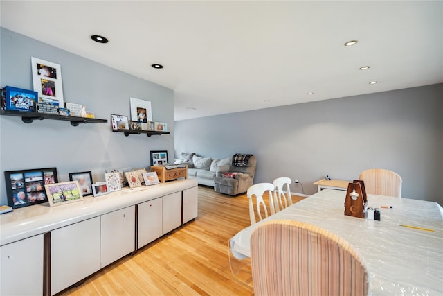 11 Robin Ln, Plainview, NY 11803 - dining space featuring light wood finished floors and recessed lighting