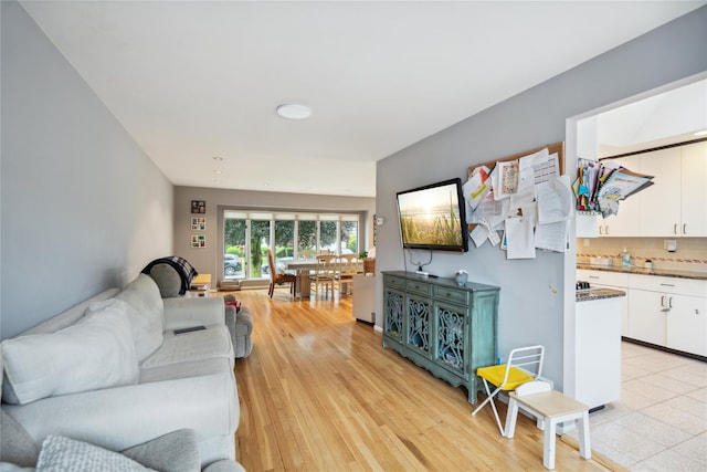 11 Robin Ln, Plainview, NY 11803 - living room with light wood-style floors