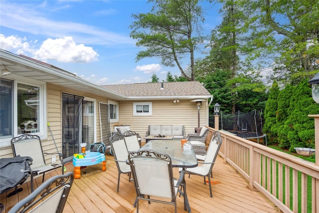11 Robin Ln, Plainview, NY 11803 - deck with a trampoline and outdoor dining area