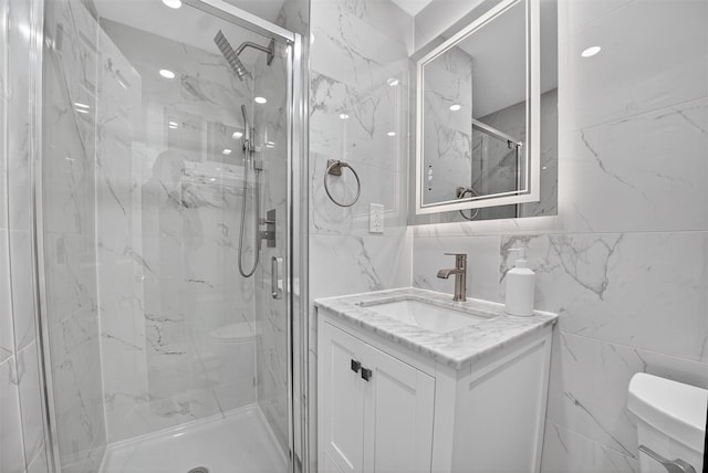 12 Valley Ln, Garrison, NY 10524 - full bathroom featuring tile walls, a marble finish shower, and vanity