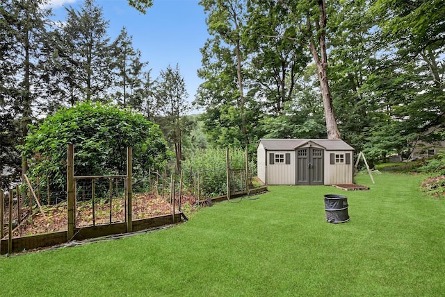 12 Valley Ln, Garrison, NY 10524 - view of green lawn featuring a garden and a storage unit