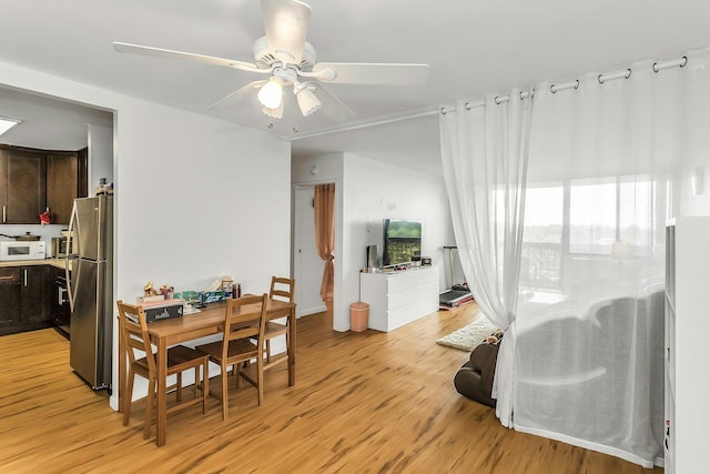 2 Bay Clb Unit 11F, Bayside, NY 11360 - dining room with light wood-style flooring and ceiling fan