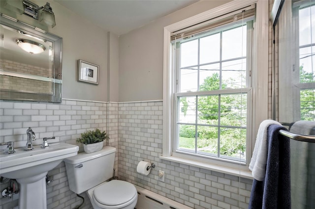 10 Cross St, Port Washington, NY 11050 - bathroom with tile walls and wainscoting