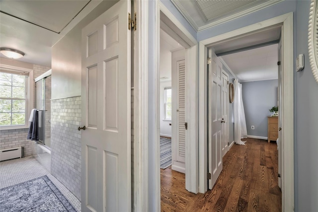 10 Cross St, Port Washington, NY 11050 - hallway with dark wood-type flooring, baseboard heating, and crown molding