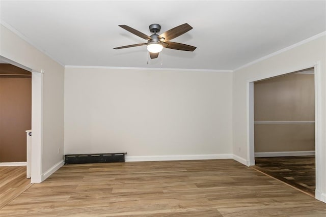 6739 Cooper Ave, Glendale, NY 11385 - empty room with ornamental molding, a ceiling fan, and light wood-type flooring