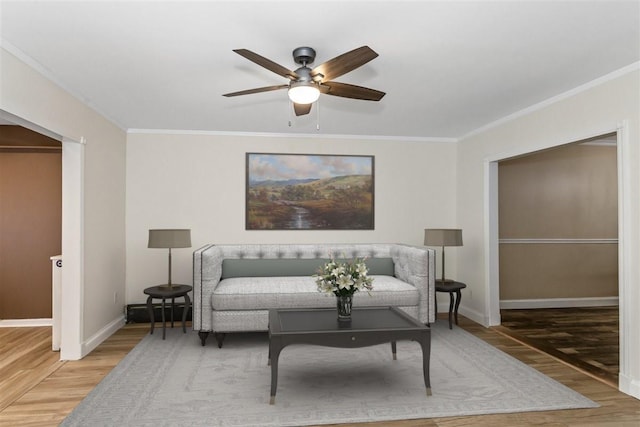 6739 Cooper Ave, Glendale, NY 11385 - living area featuring crown molding, wood finished floors, and a ceiling fan