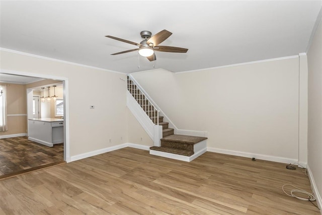 6739 Cooper Ave, Glendale, NY 11385 - stairway featuring a ceiling fan, wood finished floors, crown molding, and a chandelier