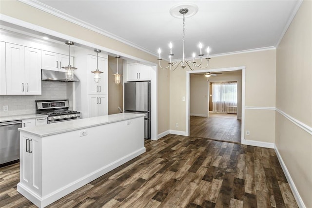 6739 Cooper Ave, Glendale, NY 11385 - kitchen featuring stainless steel appliances, a chandelier, under cabinet range hood, tasteful backsplash, and light countertops