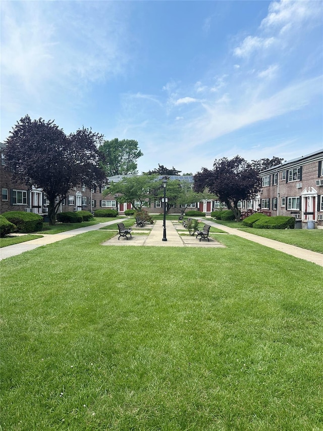 67-62 150th St Unit 426A, Flushing, NY 11367 - view of community featuring a lawn