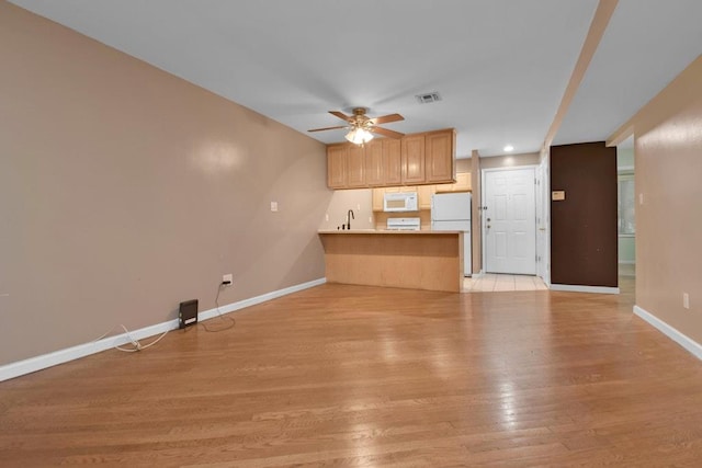 200 Davis Ave Unit 3C, Bronx, NY 10465 - unfurnished living room with ceiling fan and light wood-type flooring