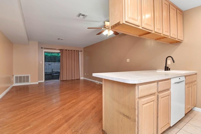 200 Davis Ave Unit 3C, Bronx, NY 10465 - kitchen featuring white dishwasher, a ceiling fan, open floor plan, light countertops, and light wood-style flooring