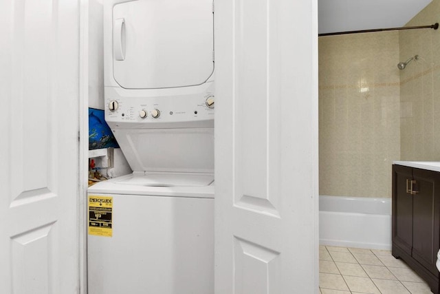 200 Davis Ave Unit 3C, Bronx, NY 10465 - laundry area with stacked washer / drying machine and light tile patterned flooring
