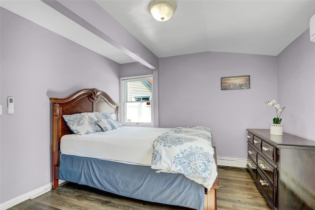 50 Apollo Ln, Hicksville, NY 11801 - bedroom with wood finished floors, lofted ceiling, and a baseboard radiator