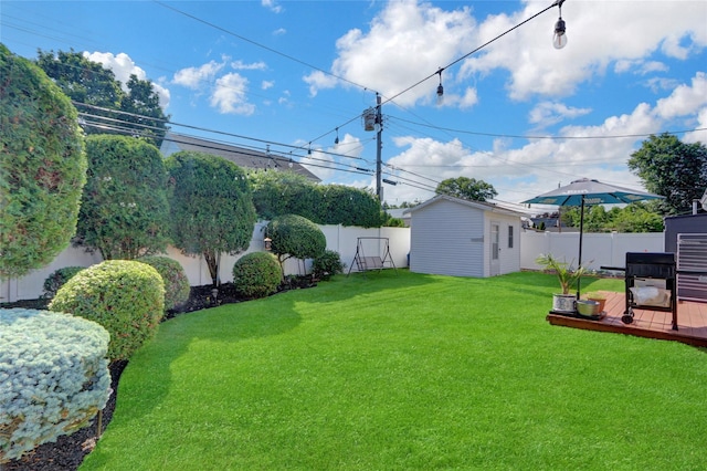 50 Apollo Ln, Hicksville, NY 11801 - fenced backyard with a deck and an outbuilding