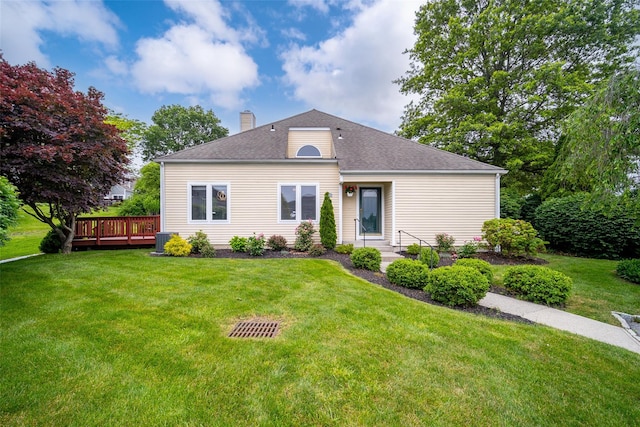 125 Fairways Cres, Carmel, NY 10512 - view of front of property featuring a chimney, a front yard, a wooden deck, and a shingled roof