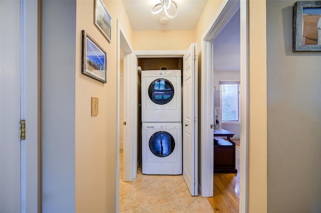 125 Fairways Cres, Carmel, NY 10512 - washroom featuring stacked washer / dryer and light tile patterned floors