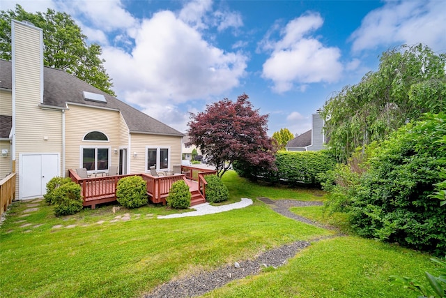 125 Fairways Cres, Carmel, NY 10512 - view of green lawn featuring a deck