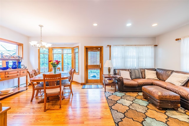 5023 213th St, Bayside, NY 11364 - living room featuring a chandelier, recessed lighting, and light wood finished floors