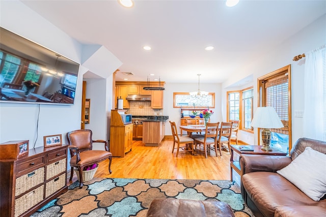 5023 213th St, Bayside, NY 11364 - dining room featuring light wood finished floors, a chandelier, and recessed lighting