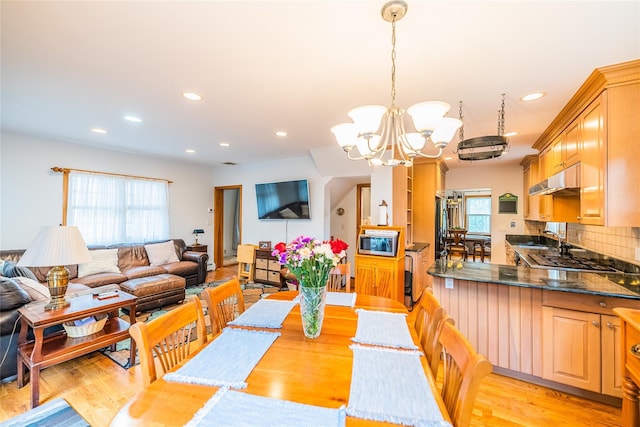 5023 213th St, Bayside, NY 11364 - dining space featuring a chandelier, light wood-style floors, and recessed lighting