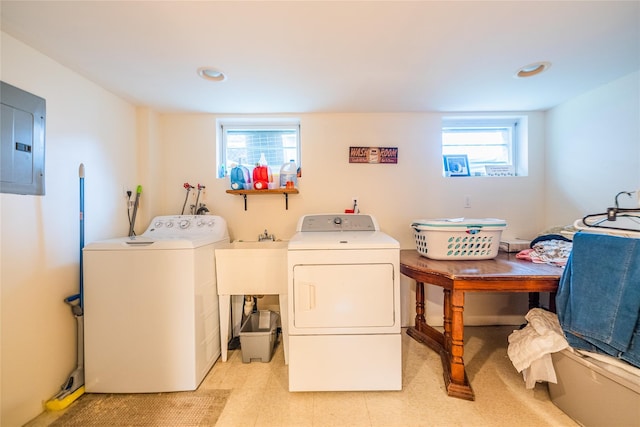 5023 213th St, Bayside, NY 11364 - laundry room with washing machine and clothes dryer, electric panel, and recessed lighting