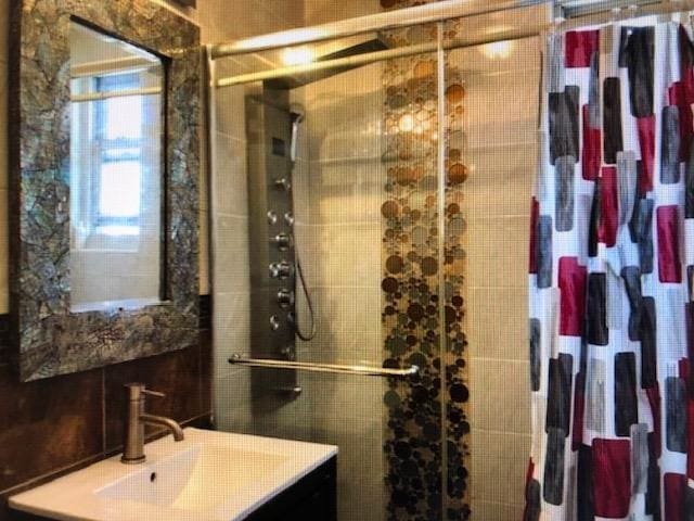 249-29 64th Ave Unit 2, Little Neck, NY 11362 - full bath with vanity and a shower