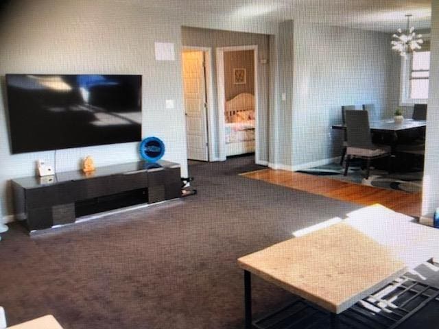 249-29 64th Ave Unit 2, Little Neck, NY 11362 - carpeted living area featuring a chandelier