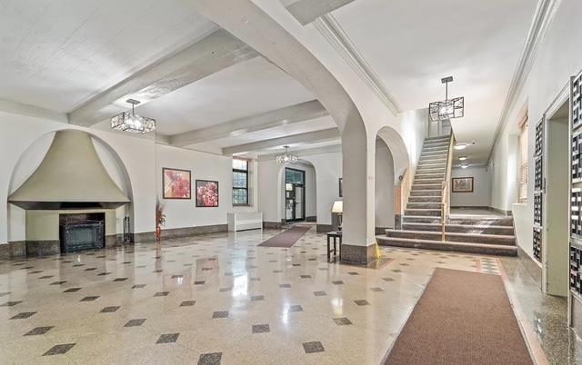 35-21 81st St Unit 1B, Jackson Heights, NY 11372 - common area with stairs and beam ceiling