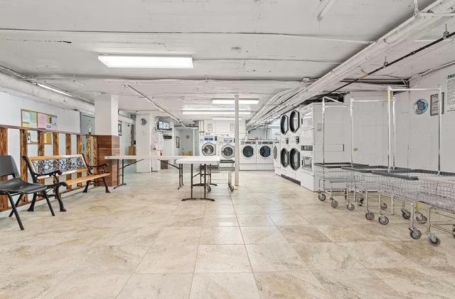 35-21 81st St Unit 1B, Jackson Heights, NY 11372 - below grade area with washing machine and clothes dryer