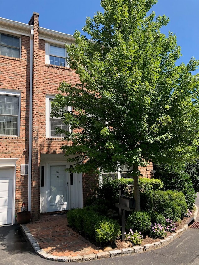 87 Marjorie Ct, Manhasset, NY 11030 - view of front of house featuring brick siding