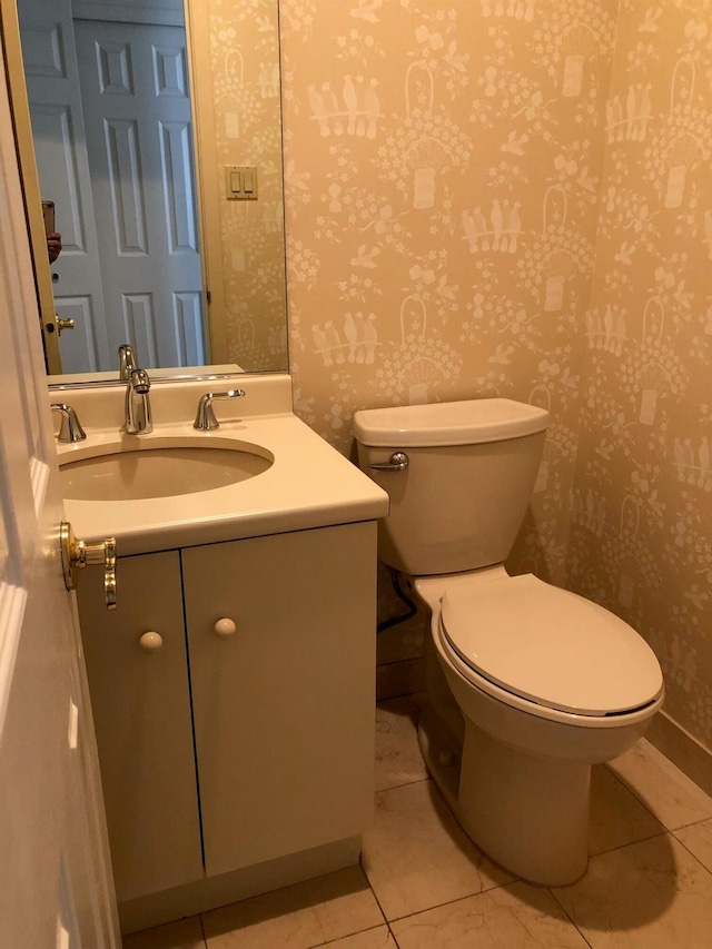 87 Marjorie Ct, Manhasset, NY 11030 - bathroom with wallpapered walls, vanity, and tile patterned floors