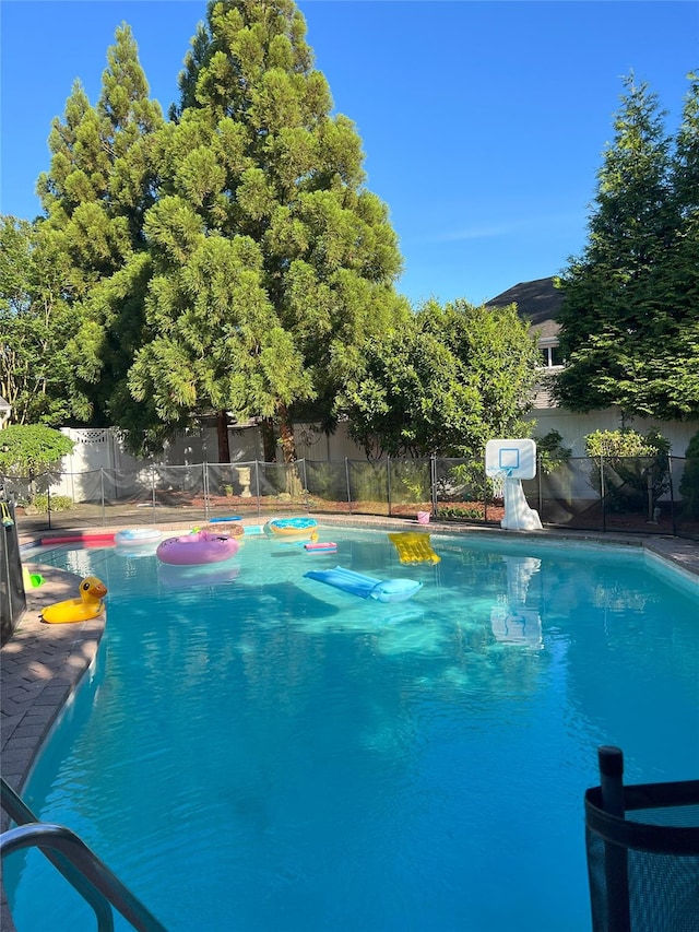 18 Sherwood Ln, Roslyn Heights, NY 11577 - view of pool featuring a fenced backyard