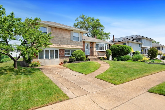 17 Damin Dr S, Farmingdale, NY 11735 - split level home with a front yard and a chimney
